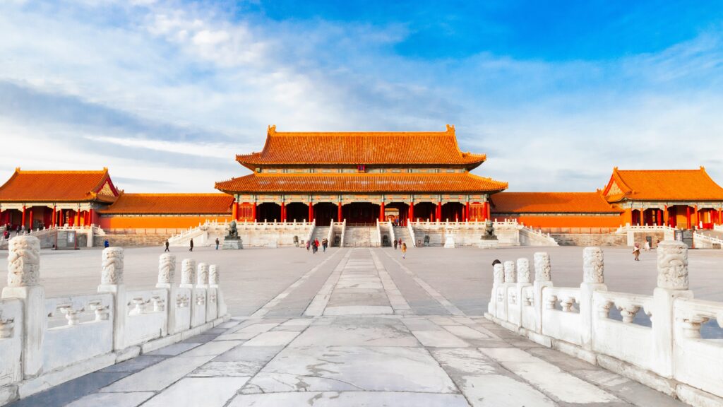 Symmetrical courtyard and golden-roofed palace within Beijing's Forbidden City